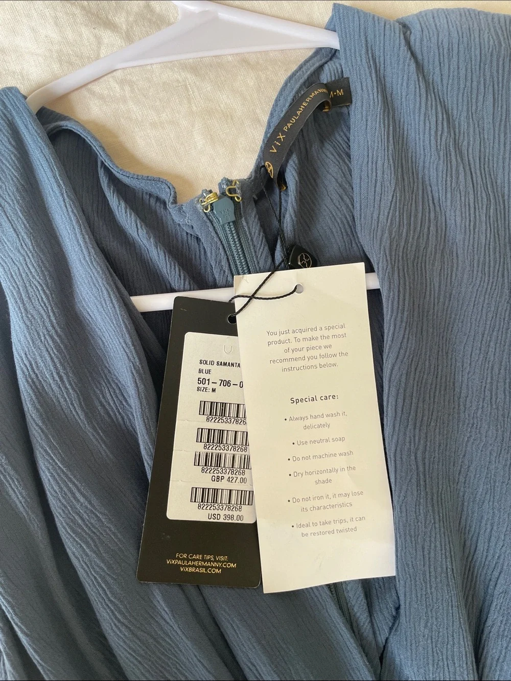 Blue V-Neck Sleeveless Pleated Jumpsuit NWT